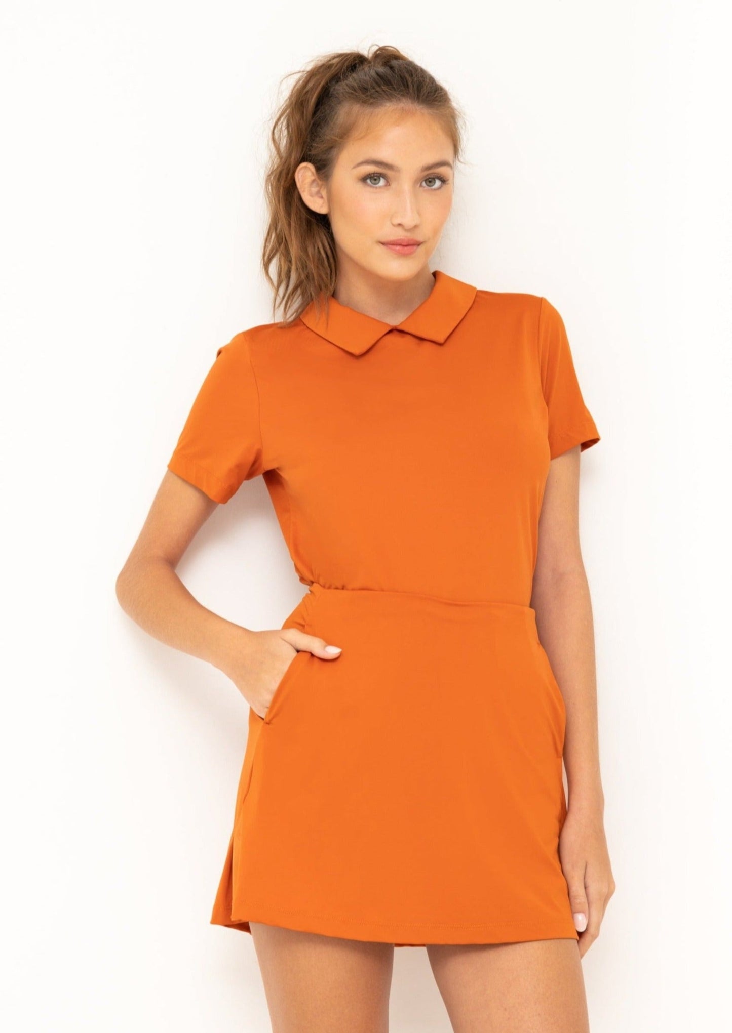 Par Social Performance Polo and Pleated Skirt in Spice